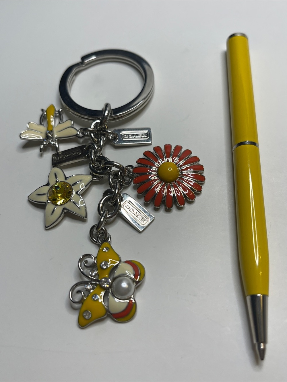 Coach Yellow & Red Daisy and Butterfly Charm Keychain and Coach Pen